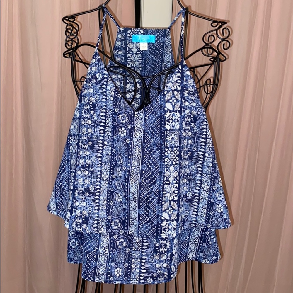 Francesca’s blue tank top